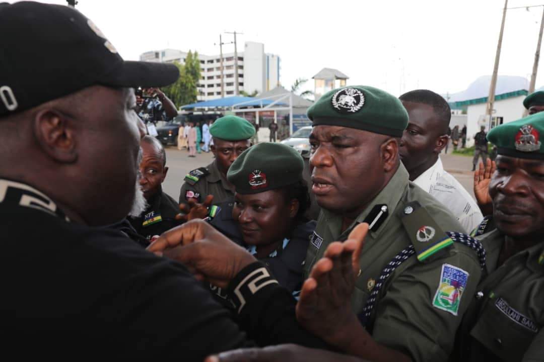 Photos From Dino Melaye's Furious Clash With Police At Abuja Protest