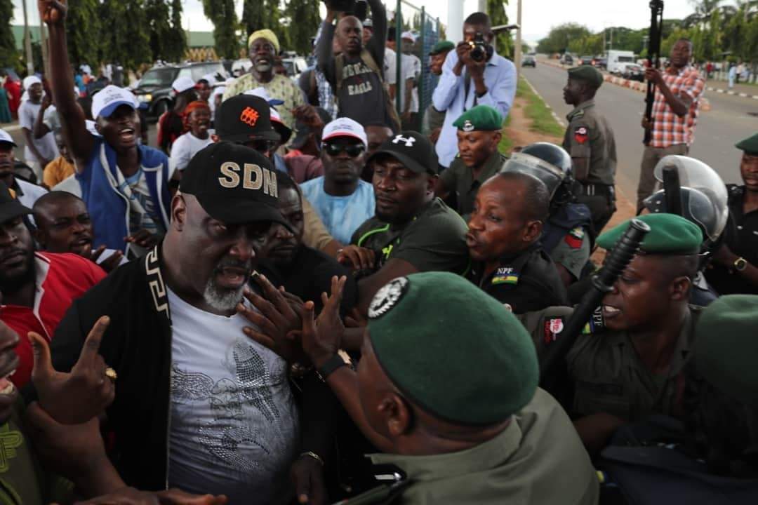 Photos From Dino Melaye's Furious Clash With Police At Abuja Protest