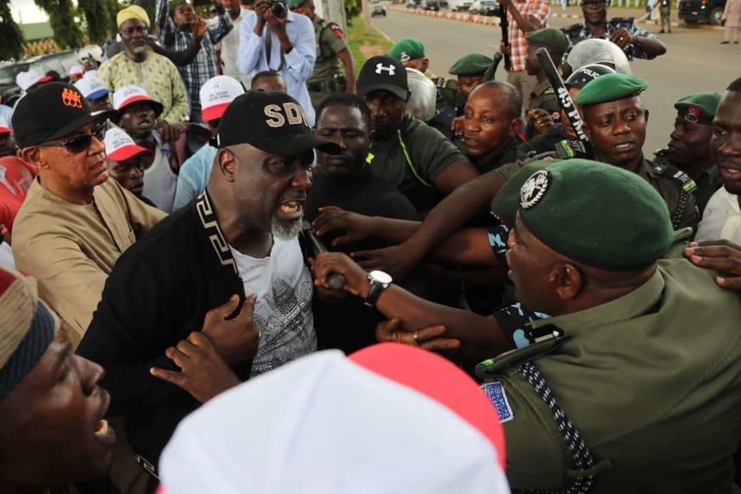 Photos From Dino Melaye's Furious Clash With Police At Abuja Protest