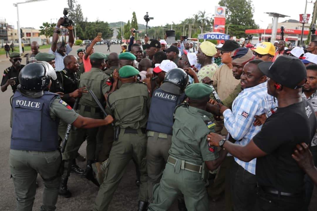 Photos From Dino Melaye's Furious Clash With Police At Abuja Protest