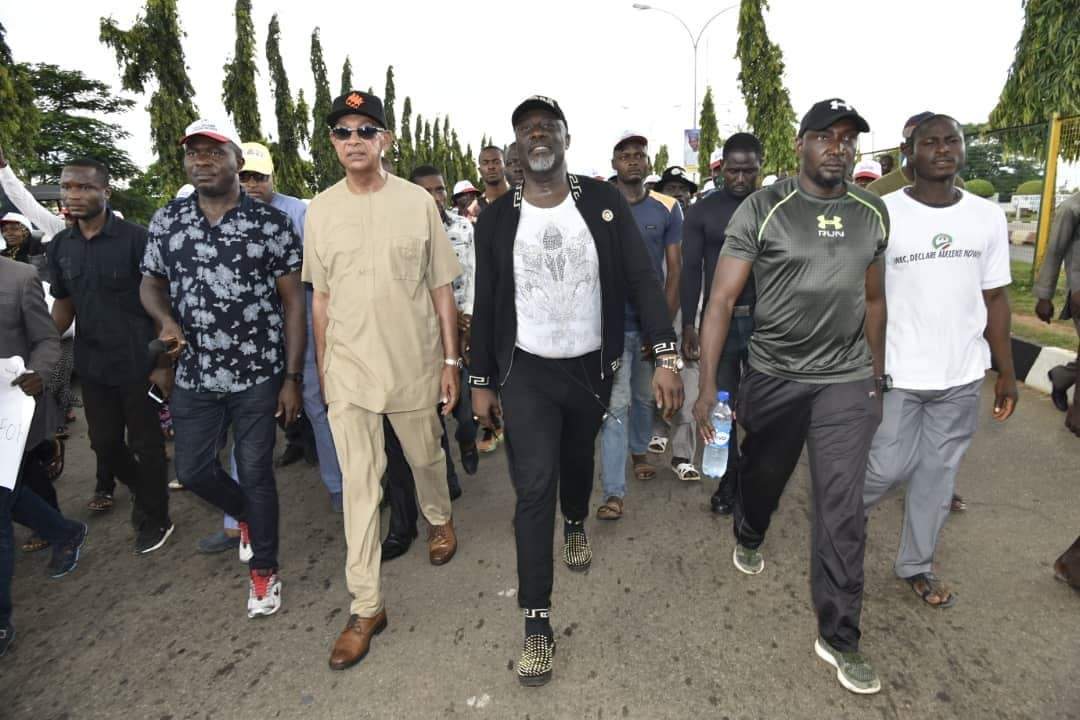 Photos From Dino Melaye's Furious Clash With Police At Abuja Protest