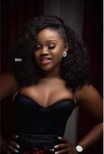 Cee-C's Boobs shooting out of her dress In new photos