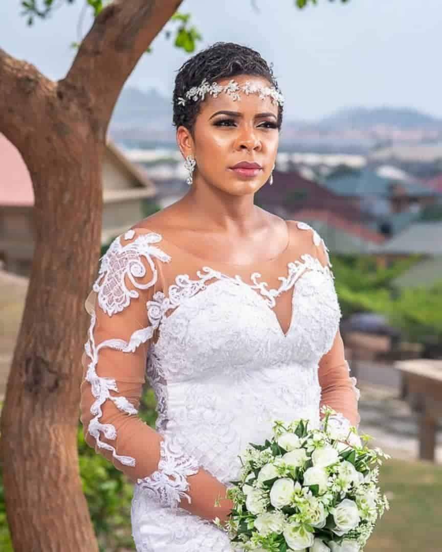 TBoss fuels pregnancy rumors after releasing wedding-themed photos