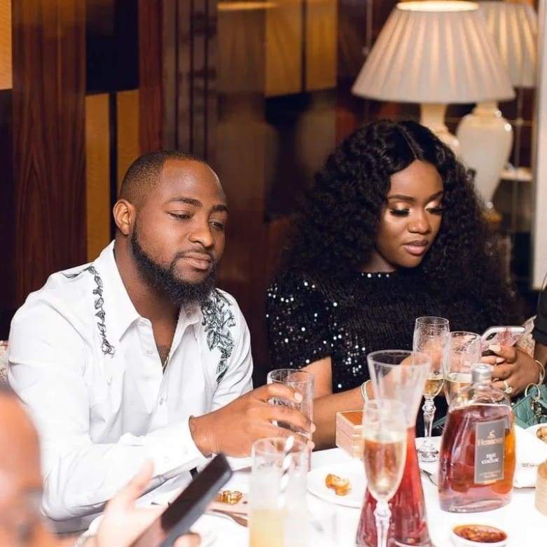Davido and his fiancee Chioma sharing a romantic moment in their kitchen (Video)