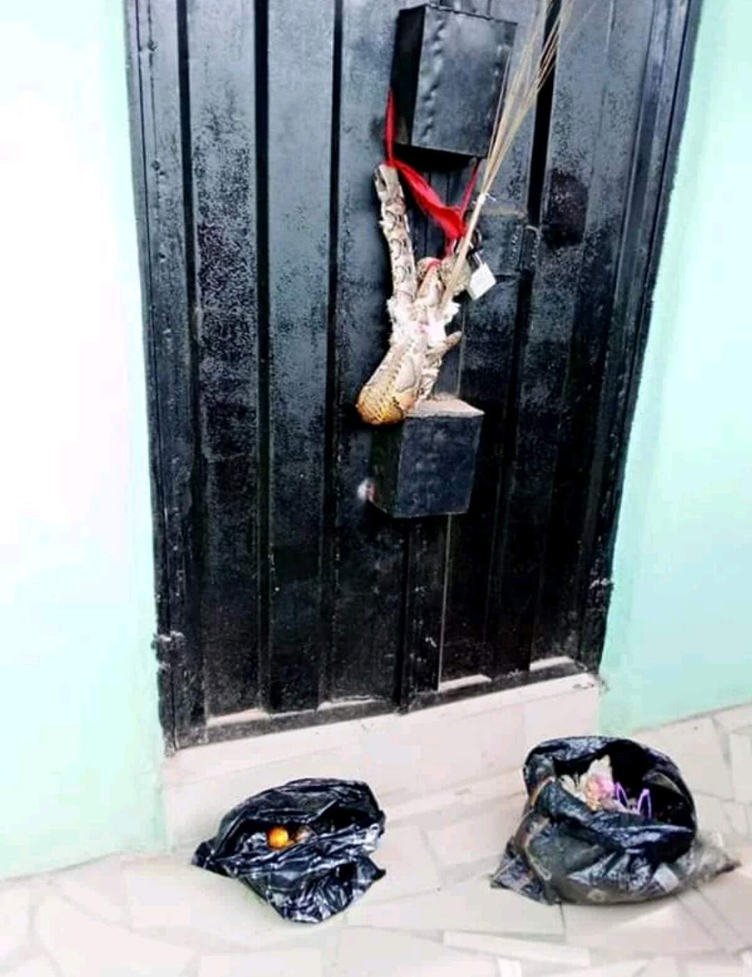 Woman dumps snake charm at the shop of lady who snatched her husband