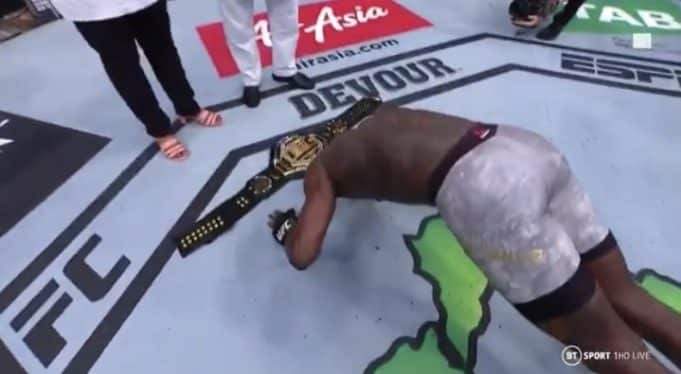 Moment Isreal Adesanya Prostrated And Presented His Belt To His Parents (Photos)