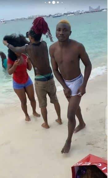 BBNaija's Esther engaging In 'Rough Play' with guys at Dubai beach (Photos)