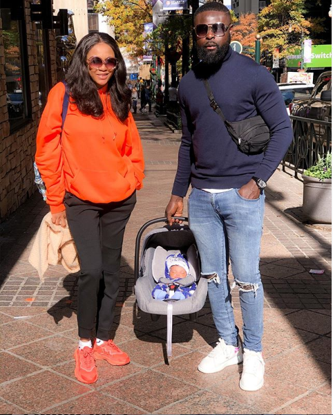 Yomi Casual and wife Grace step out with their newborn son Kendrick