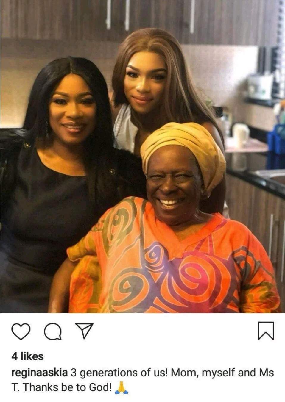 Regina Askia, her mother, and daughter pose for lovely three-generation photo