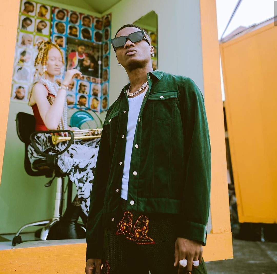 Wizkid replies man who begged him to pay tribute to his late mom