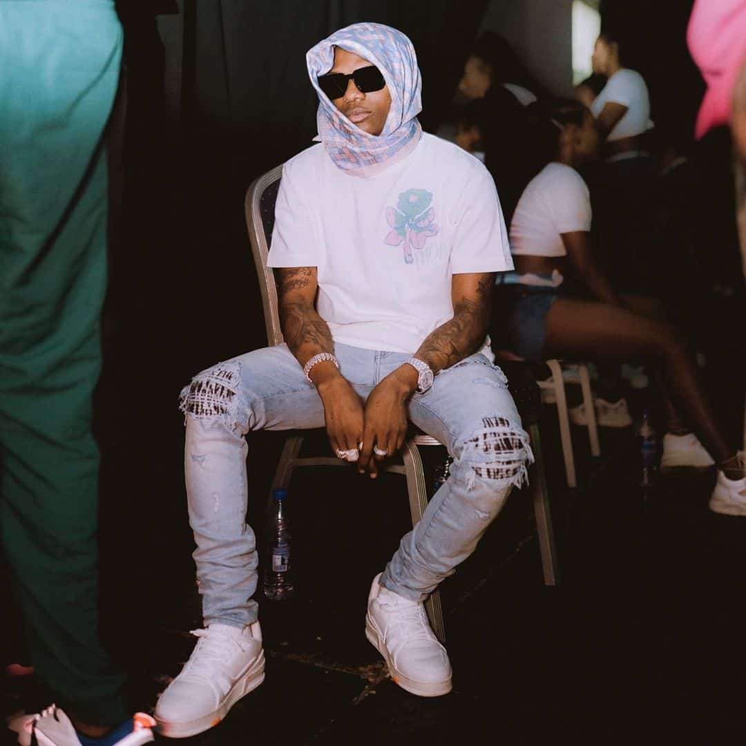 Wizkid reacts after a police officer shot dead a fan at his concert