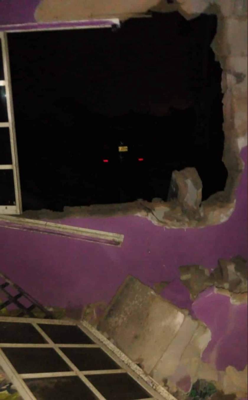 Woman cheats death, escapes unharmed as heavy storm blows away her windows and doors at night (Photos)
