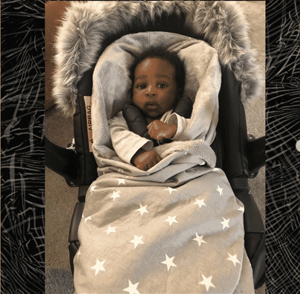 Zlatan Ibile shares first photo of his new baby boy to celebrate children's day (Photos)