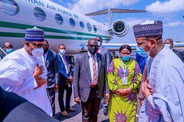 President Buhari finally wears a face mask for the first time (Photos)
