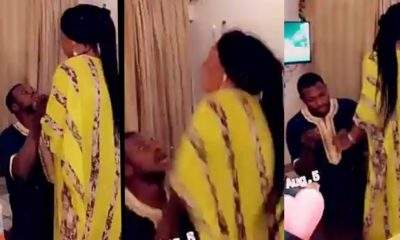 Man forcefully tries to put a ring on his girlfriend's finger as she rejects his proposal after years of dating (Video)