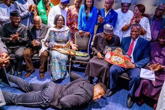Anthony Joshua prostrates as he presents Heavyweight Titles to Buhari (Photos)