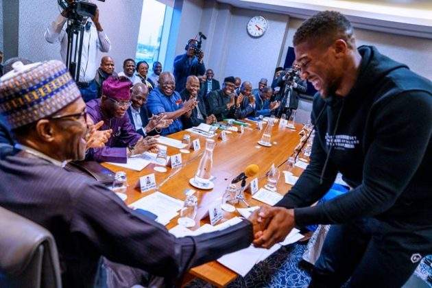 Anthony Joshua prostrates as he presents Heavyweight Titles to Buhari (Photos)