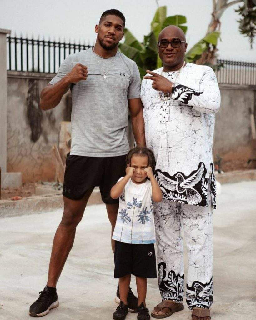 Anthony Joshua Shares Lovely Photo Posing With His Father And Son In Nigeria