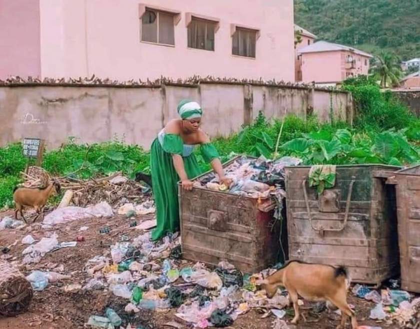 Nigerian lady celebrates Independence day with bizarre photos in a slum