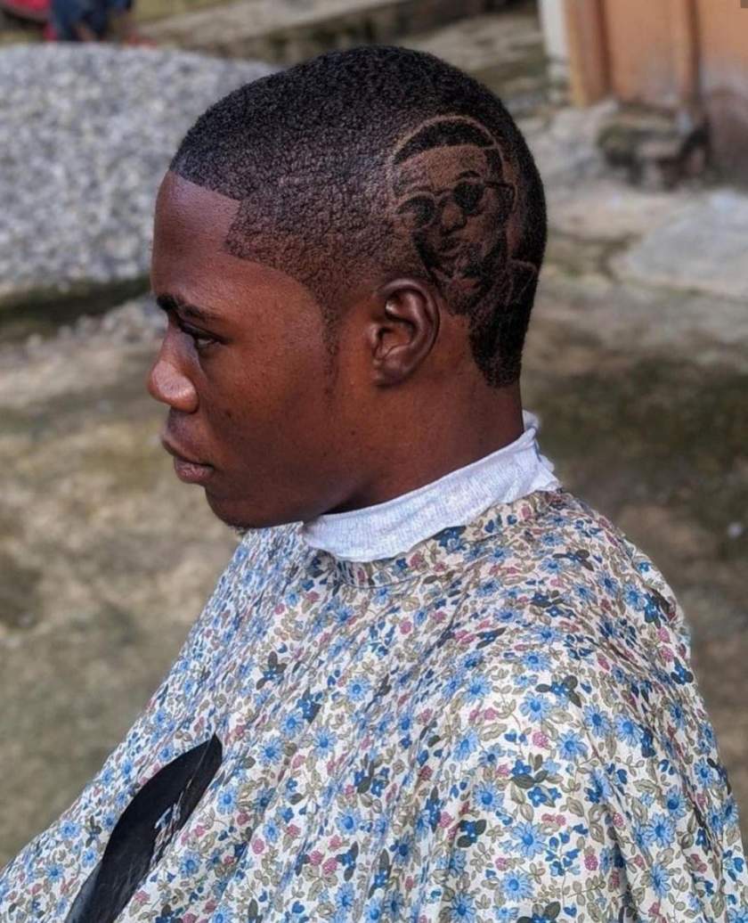 Nigerian Barber Goes Viral After Carving Wizkid's Face On Customer's Hair (Photos)