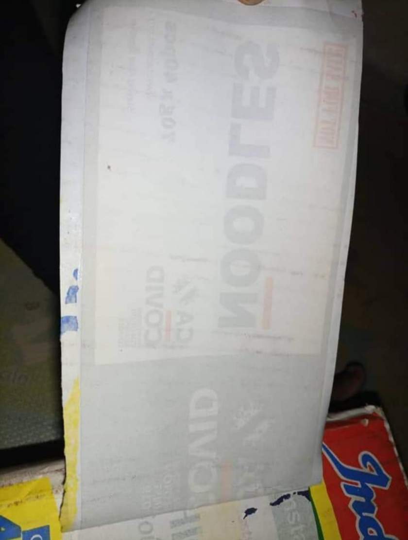 'How heartless can people be?' - Lady laments after seeing COVID19 sticker on the carton of indomie she bought (Photos)