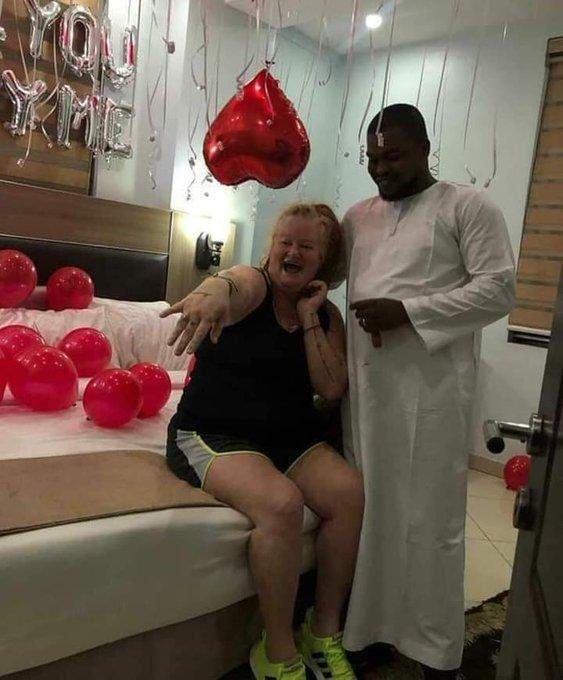 'She said yes' - Nigerian man proposes to his older white lover (Photos)