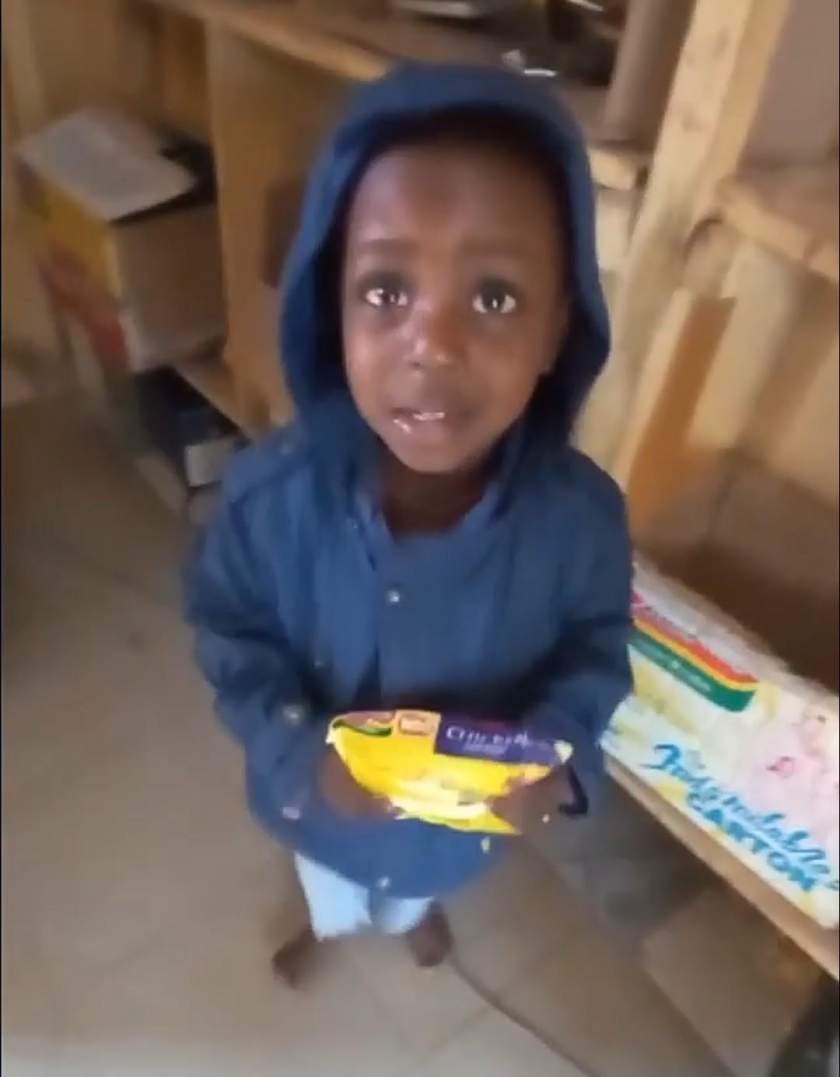 'Give me my palliative' - Little boy breaks down in tears as he drags indomie with his mom (Video)
