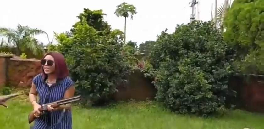 Watch Video Of Ned Nwoko Teaching Regina Daniels How To Fire A Gun