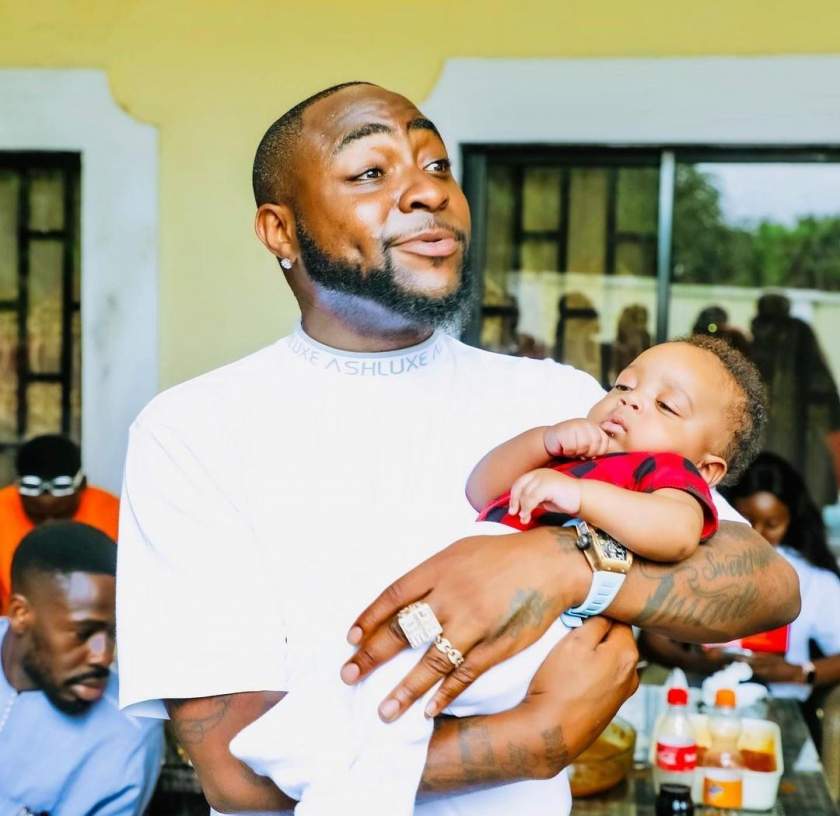 Checkout these adorable photos of Davido cuddling Regina Daniels' son, Munir