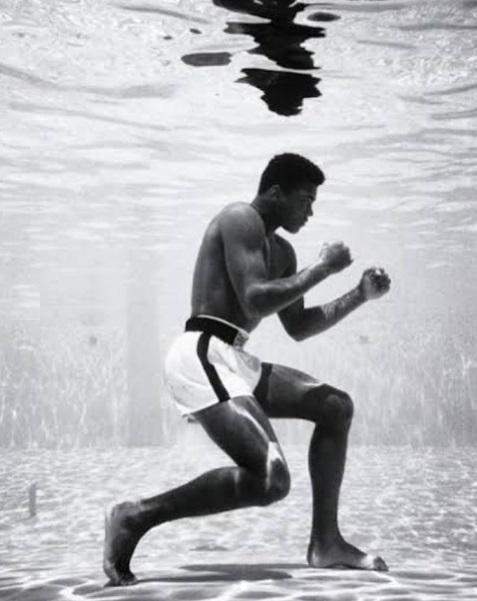 BBNaija star, Ozo Recreates 1961 Picture Of Legendary Boxer, Muhammad Ali Training In A Pool
