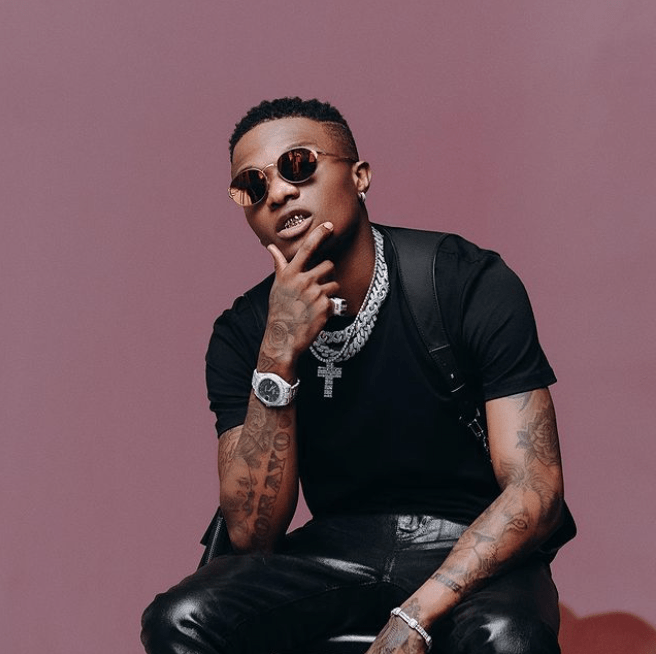"Looking for these two criminals!" - Wizkid calls out Tinie Tempah and his manager Dumi
