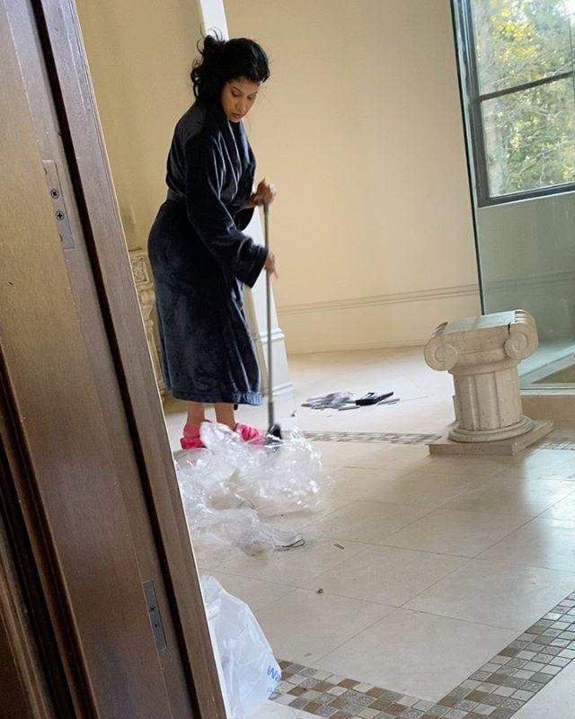 cardi b sweeping, doing house chores