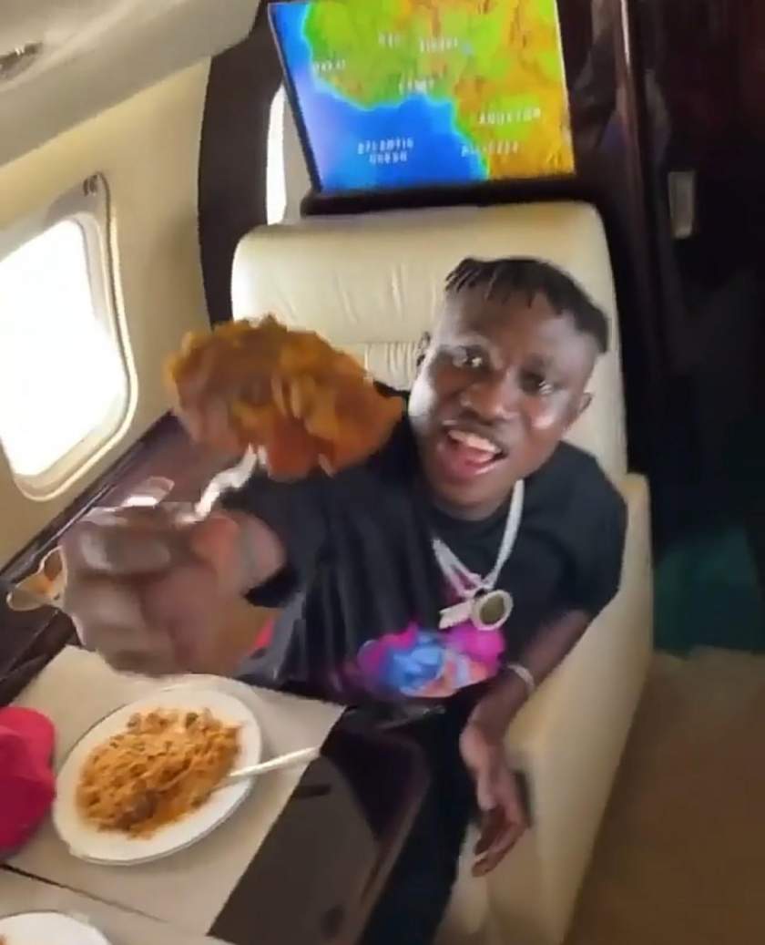 Watch video of Zlatan Ibile feeding Davido inside a private Jet