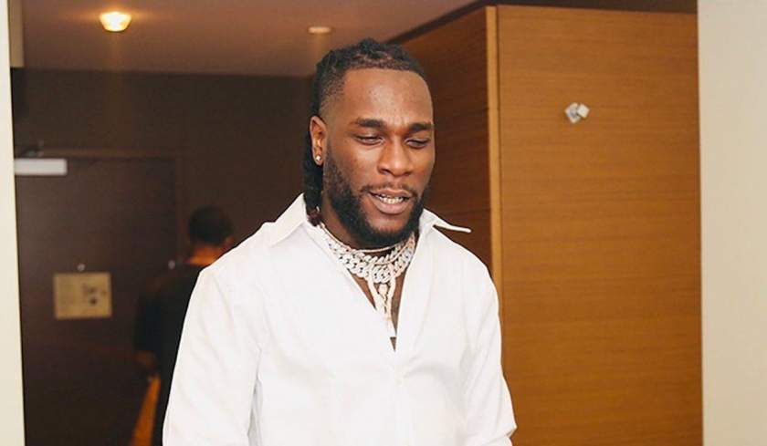 Burna Boy reacts amidst cheating rumour with a 'bootylicious' side chic