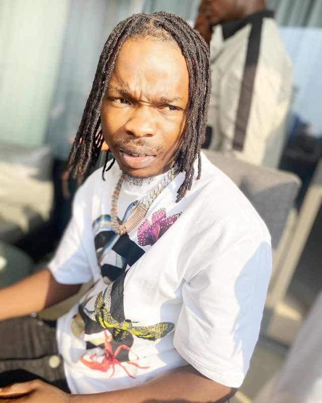 Naira Marley applauds Cameroonian who tattooed his name on her chest (Video)