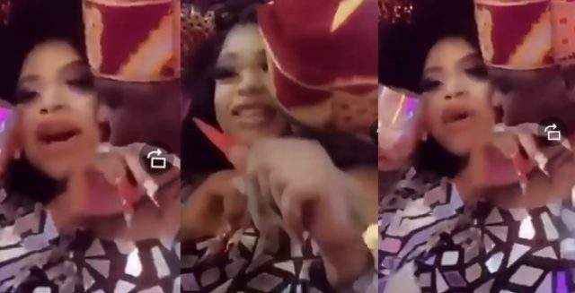 Nigerian man seen trying so hard to kiss cross-dresser, Bobrisky (Video)