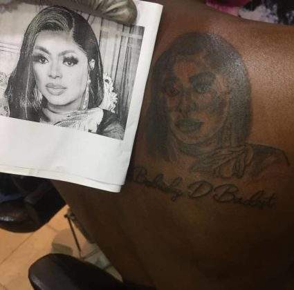 Bobrisky reacts as man draws tattoo of him on his back (Photo/Video)