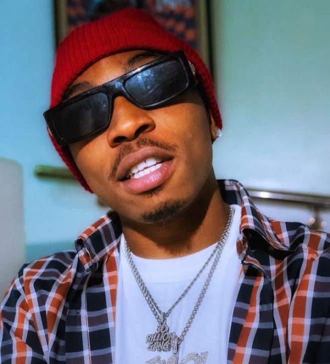 Mayorkun reacts after a pregnant lady tattooed his face on her baby bump
