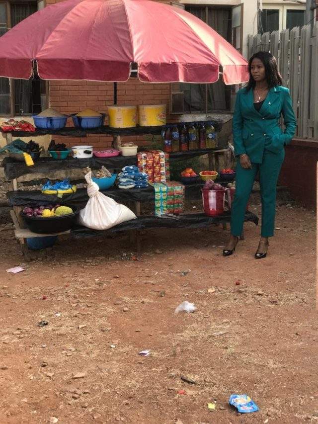 Lady leaves Nigerians in awe as she rocks corporate outfit to sell foodstuffs in Abuja
