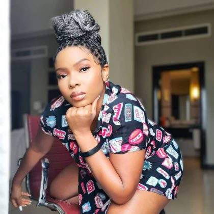 'Dressing like this won't get you a husband' - Man attacks Yemi Alade over birthday outfit