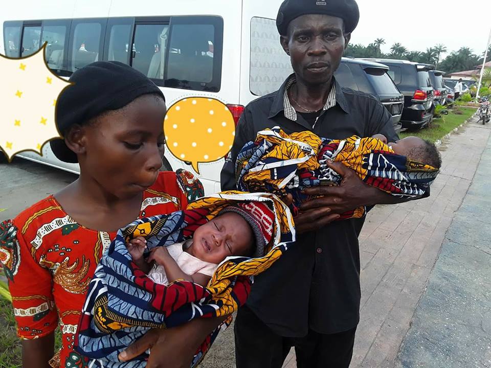 Nigerian Man Carries His Twin Babies Begging For Help After His Wife Died After Giving Birth