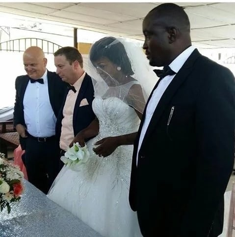 Angry 'side chick' dressed in bridal gown disrupts wedding ceremony of her lover (Video)