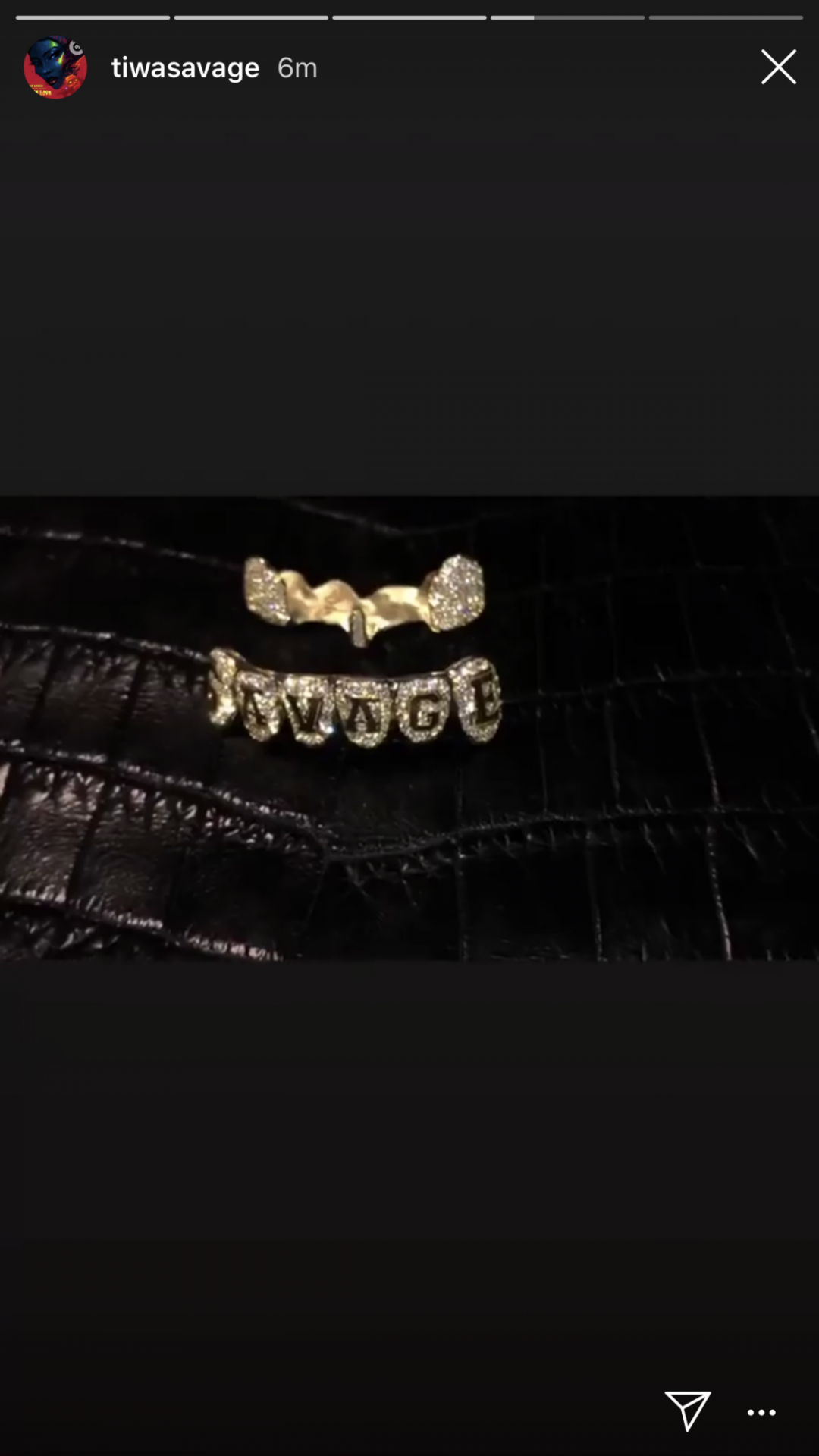 Tiwa Savage flaunts her diamond teeth grills