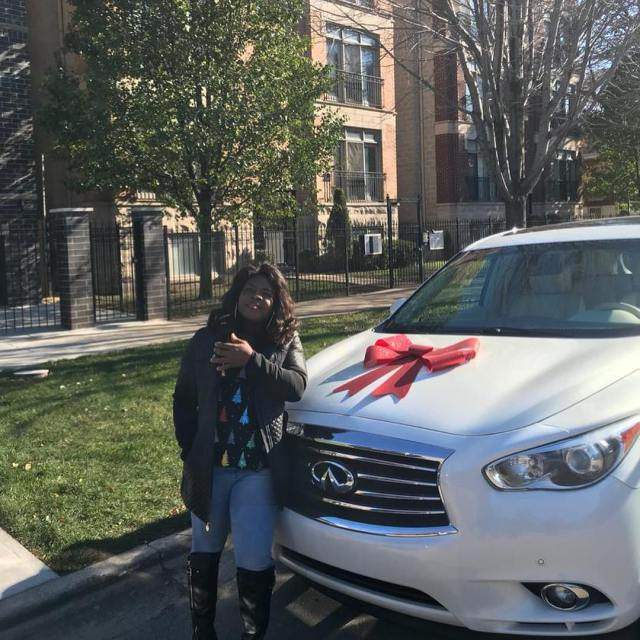 Nigerian lady screams uncontrollably as husband surprises her with brand new Infiniti SUV (Photos)