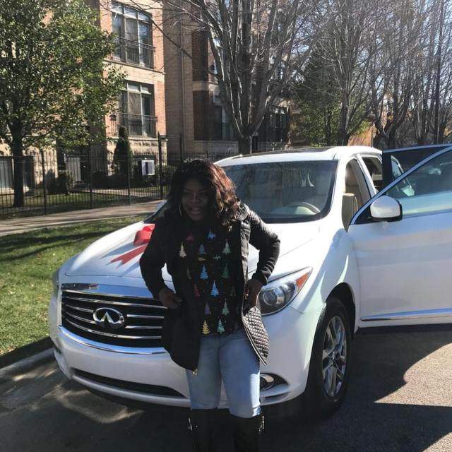 Nigerian lady screams uncontrollably as husband surprises her with brand new Infiniti SUV (Photos)