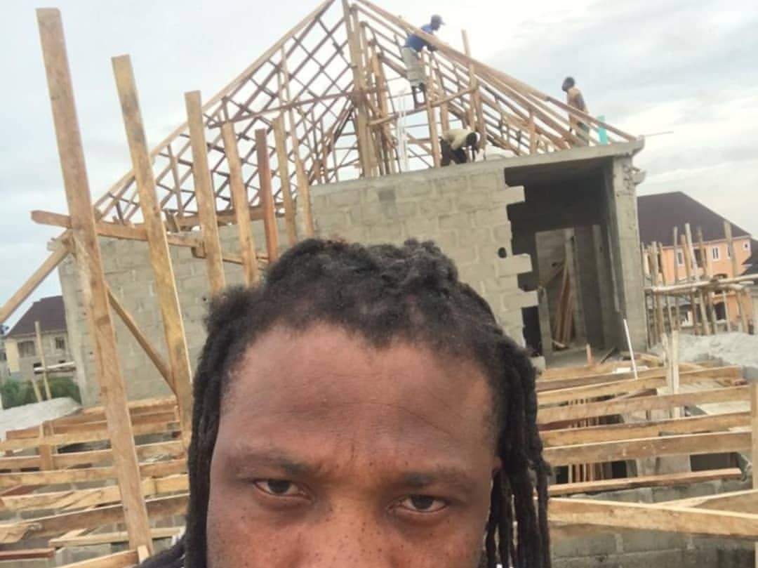 Check out African China's reply to a troll who asked him to stop showing off his house that is still under construction