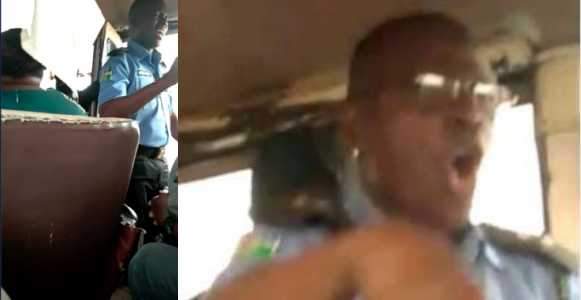 Nigerian policeman seen preaching about love inside a commercial bus (Video)