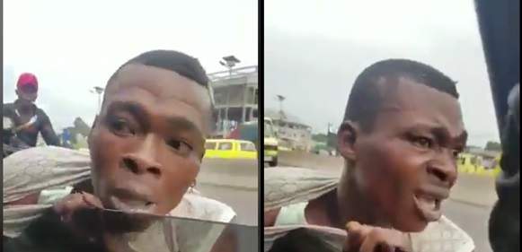 Traffic thief slapped ruthlessly after he's caught trying to steal phone in moving car (Video)