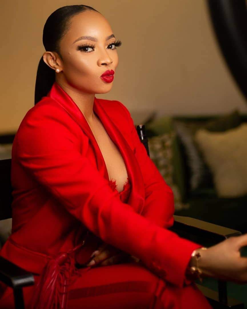 Photos: Toke Makinwa slays in red suit