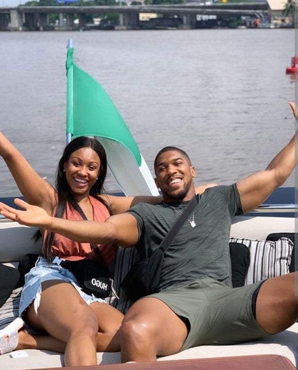 Dangote Hosts Anthony Joshua, Sister On His ₦15.5 Billion Luxury Boat (Photos)